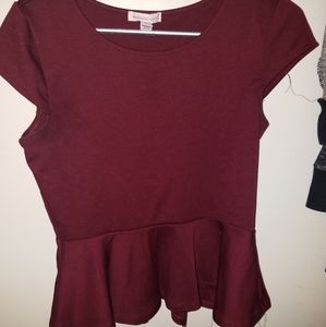Sexy burgundy blouse with flared bottom